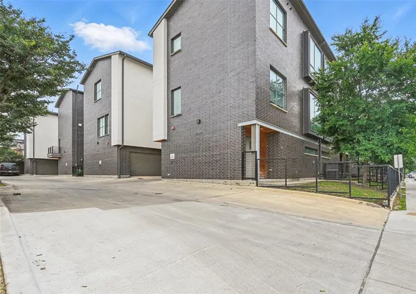 a view of a building with a street