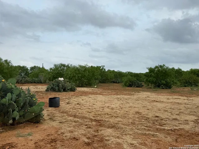 a view of a lake with open space