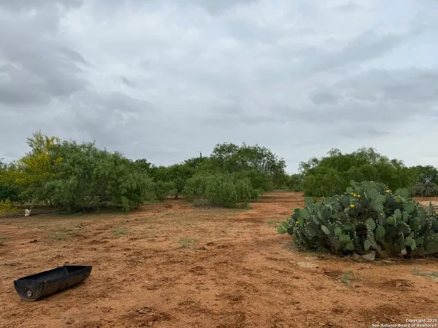 a view of lake with green space