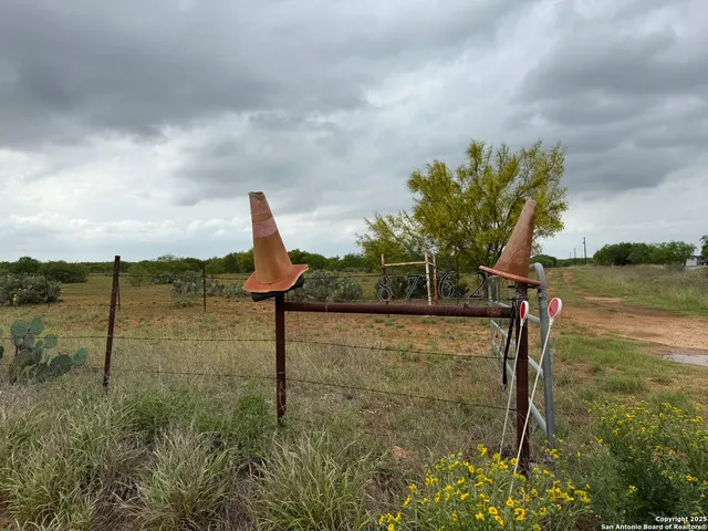 a view of a lake with green space