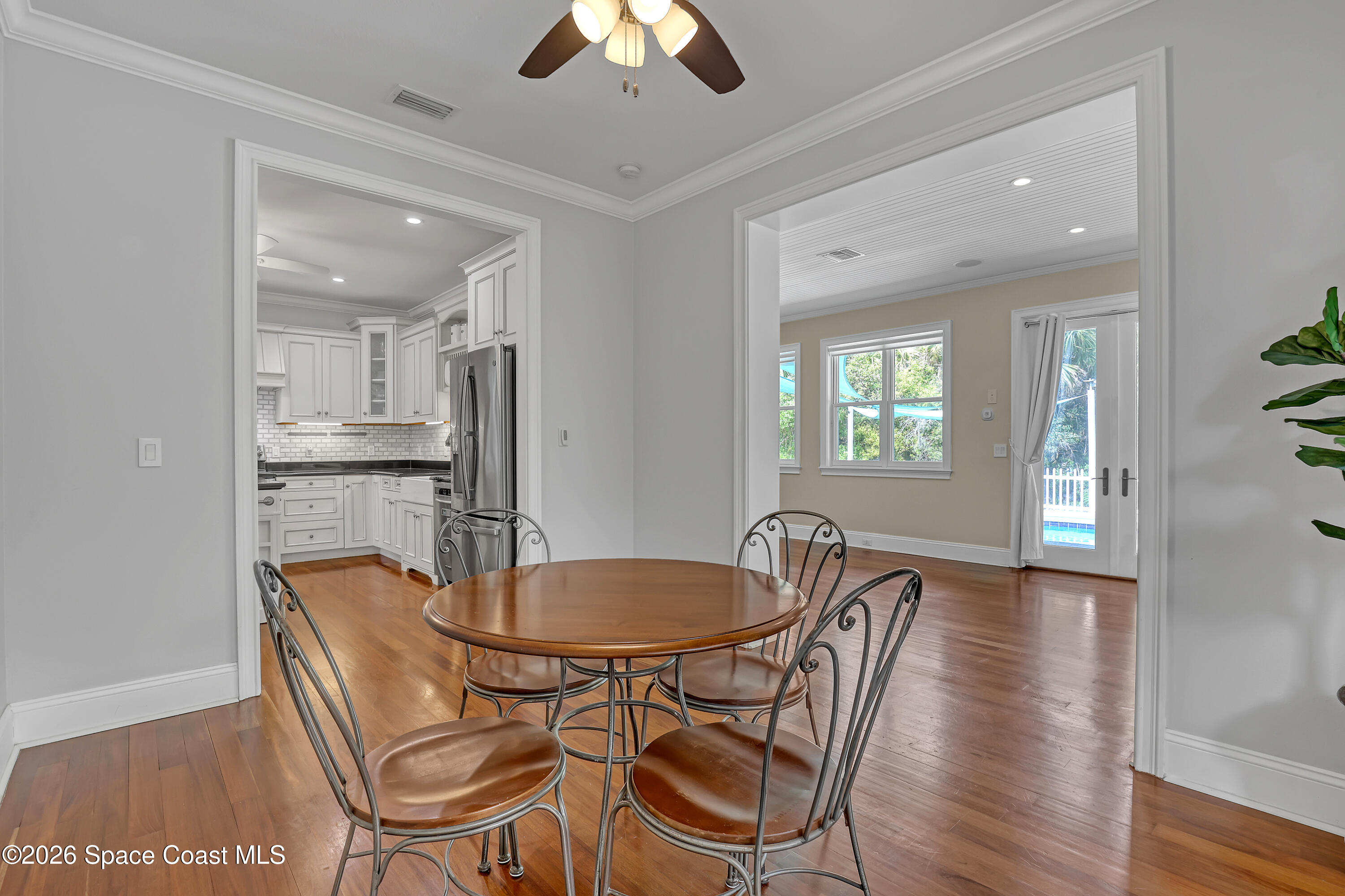 4200 Mustang Road Melbourne, FL 32934 - Photo 25 of 58 a dining room with furniture and window