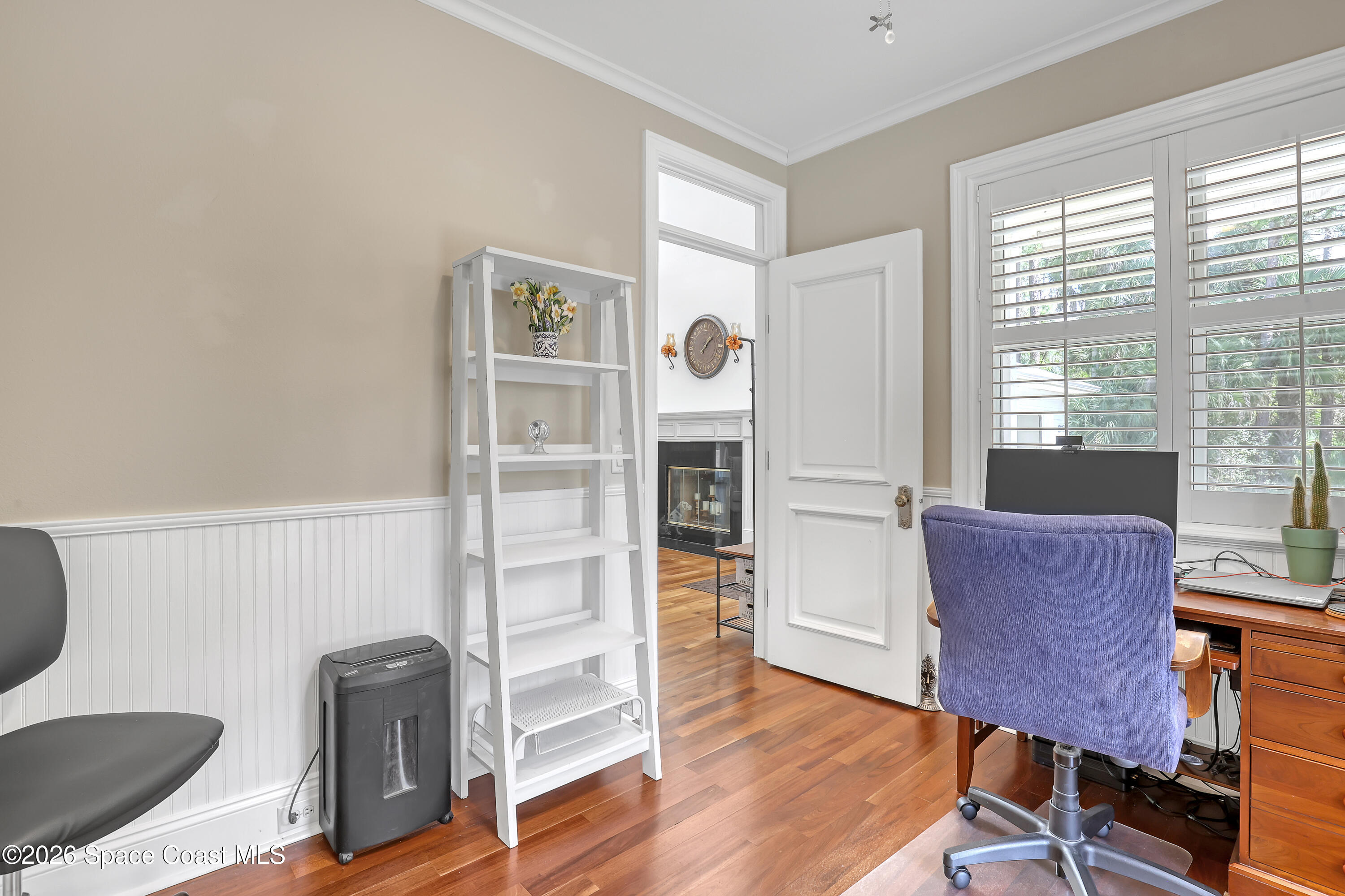 4200 Mustang Road Melbourne, FL 32934 - Photo 31 of 58 a living room with furniture and a window