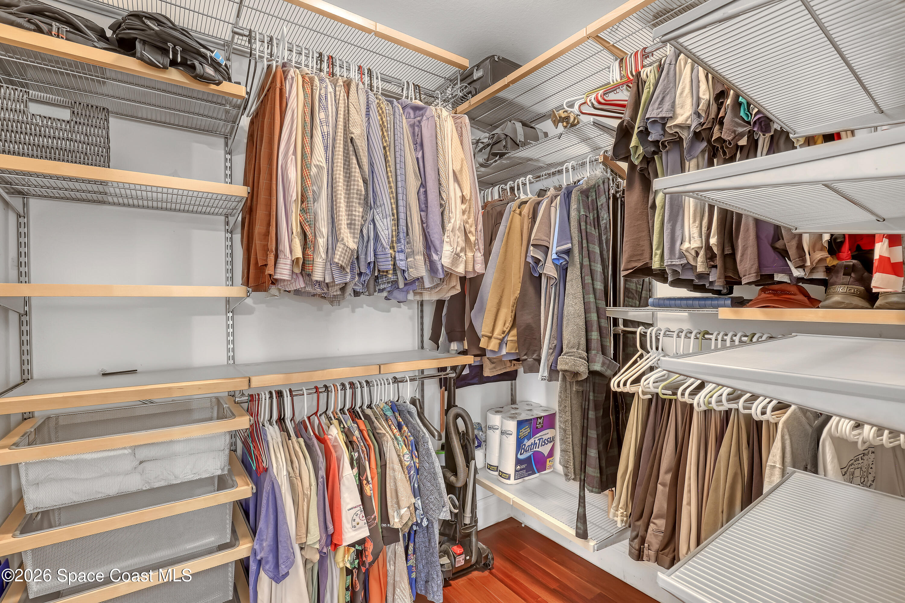 4200 Mustang Road Melbourne, FL 32934 - Photo 38 of 58 a view of walk in closet with clothes and shoes