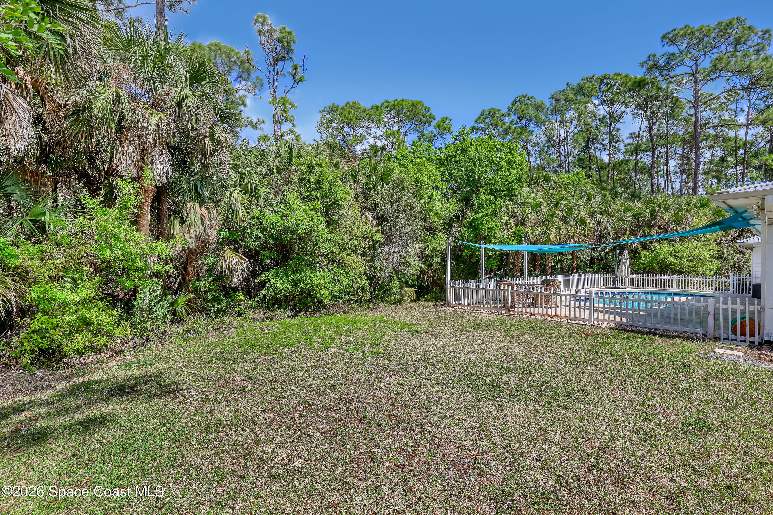 4200 Mustang Road Melbourne, FL 32934 - Photo 55 of 58 a view of a backyard