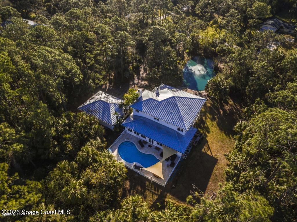 4200 Mustang Road Melbourne, FL 32934 - Photo 57 of 58 a view of a chairs and table in the patio