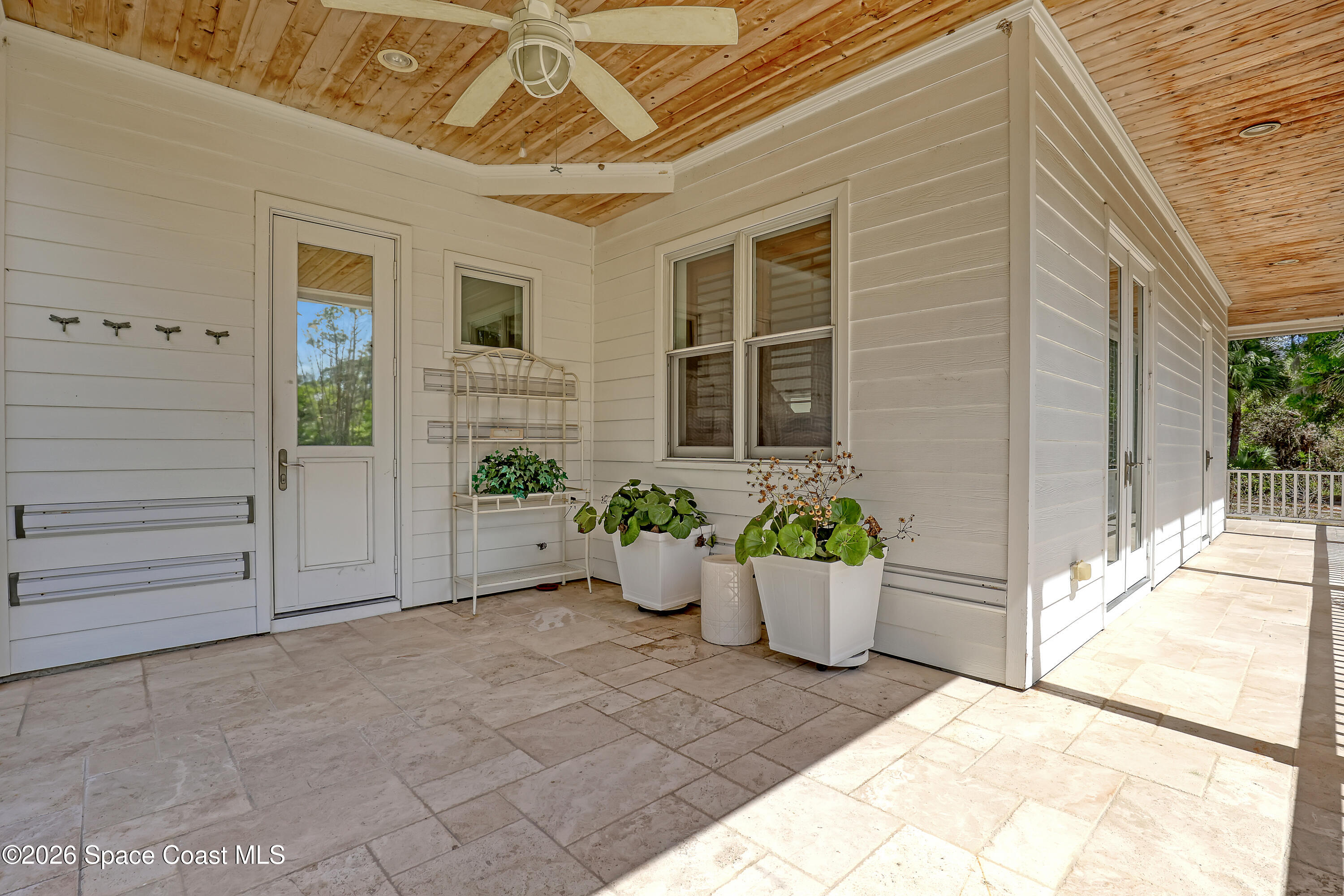 4200 Mustang Road Melbourne, FL 32934 - Photo 10 of 58 a view of a entryway door front of house