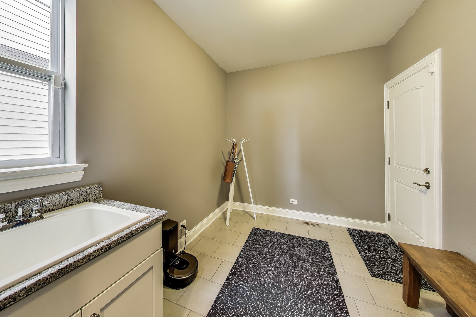 557 North Myrtle Avenue Elmhurst, IL 60126 - Photo 16 of 33 a bathroom with a granite countertop sink and a mirror