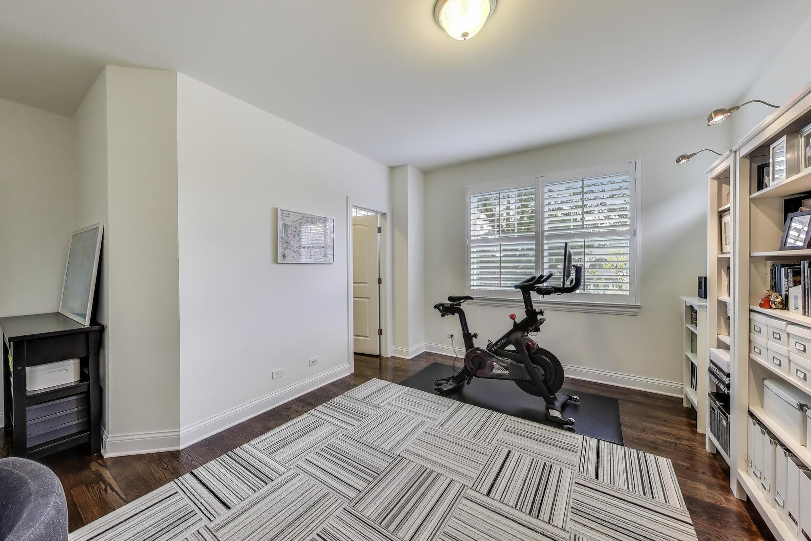 557 North Myrtle Avenue Elmhurst, IL 60126 - Photo 29 of 33 a living room with furniture a rug and a window
