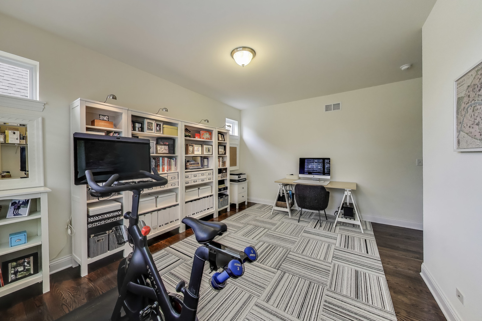 557 North Myrtle Avenue Elmhurst, IL 60126 - Photo 30 of 33 a living room with furniture and a flat screen tv