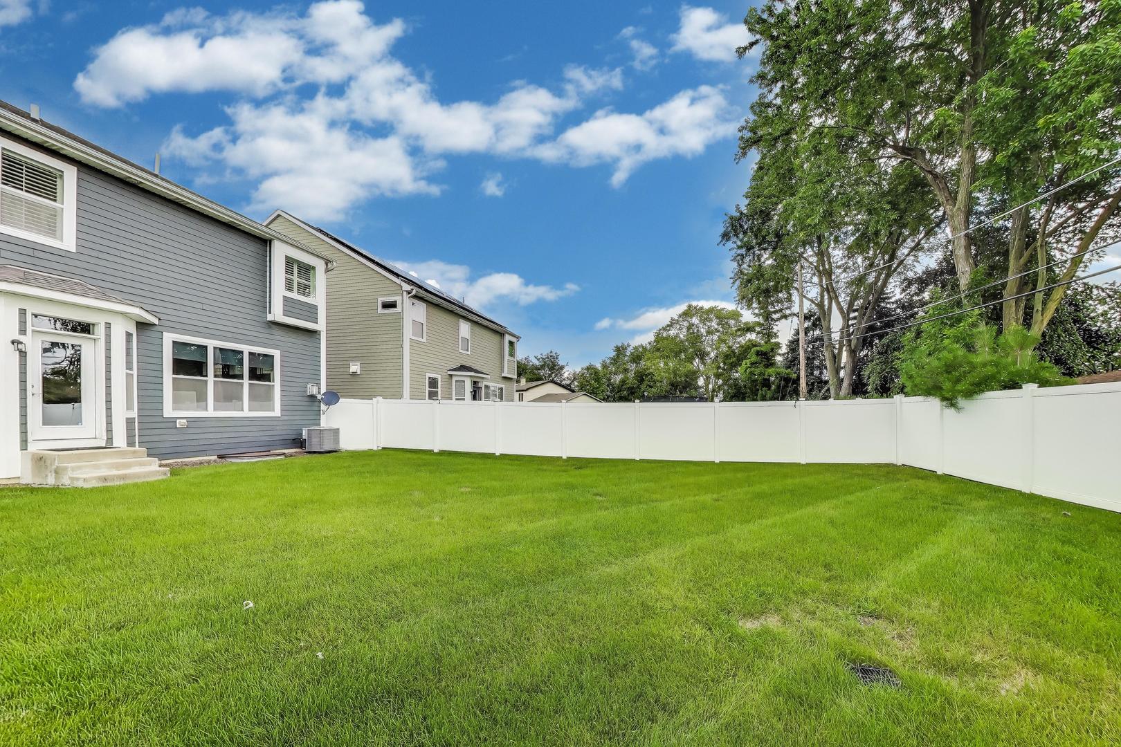 557 North Myrtle Avenue Elmhurst, IL 60126 - Photo 32 of 33 a view of a house with a yard