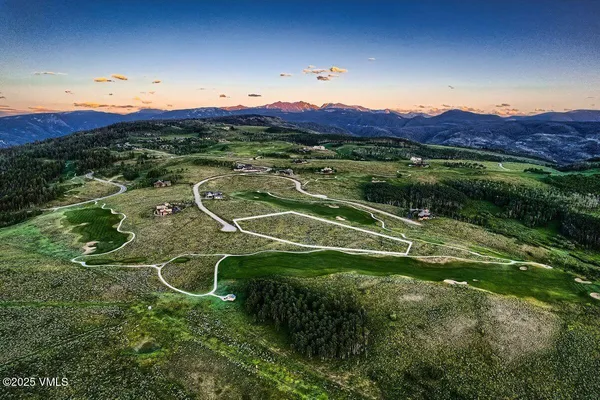 a view of a houses with a yard