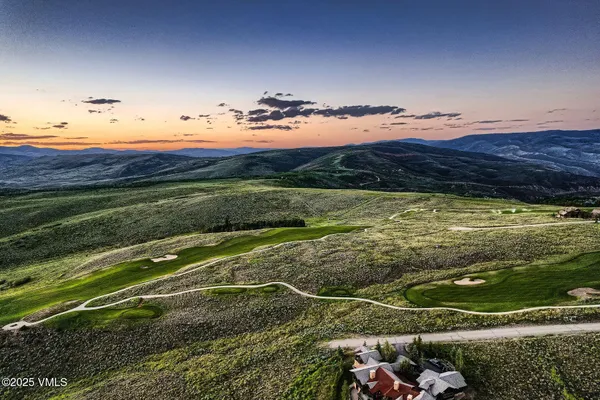 a view of a lake with a mountain in the background
