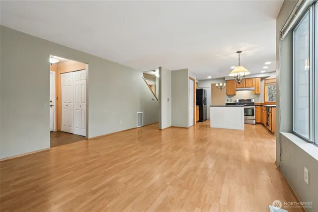 a view of a kitchen with a sink and a kitchen