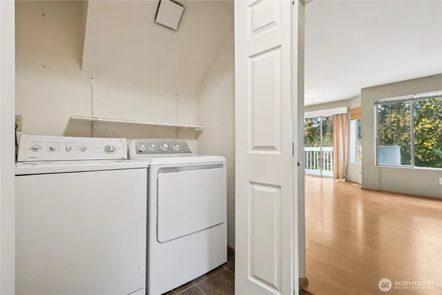 a utility room with dryer and washer