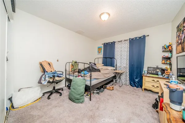 a bedroom with furniture and a equipment