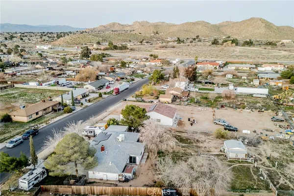 an aerial view of residential house with outdoor space