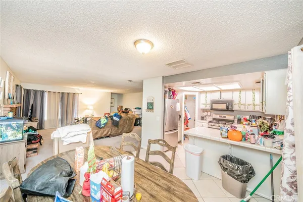 a living room with furniture and a table