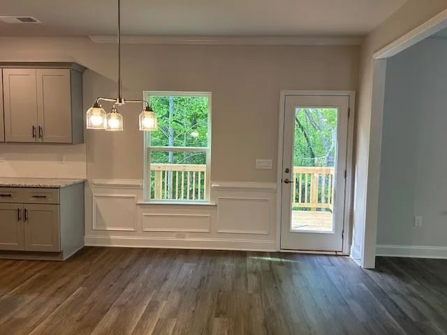 a room with window and wooden floor