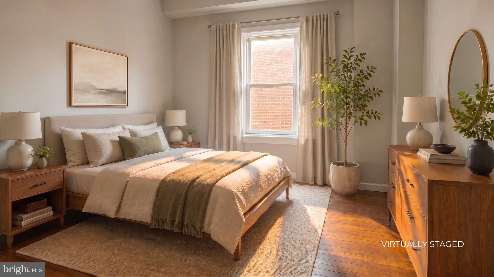 154 Andrew Street Hamilton, NJ 08610 - Photo 13 of 29 a spacious bedroom with a bed and a potted plant