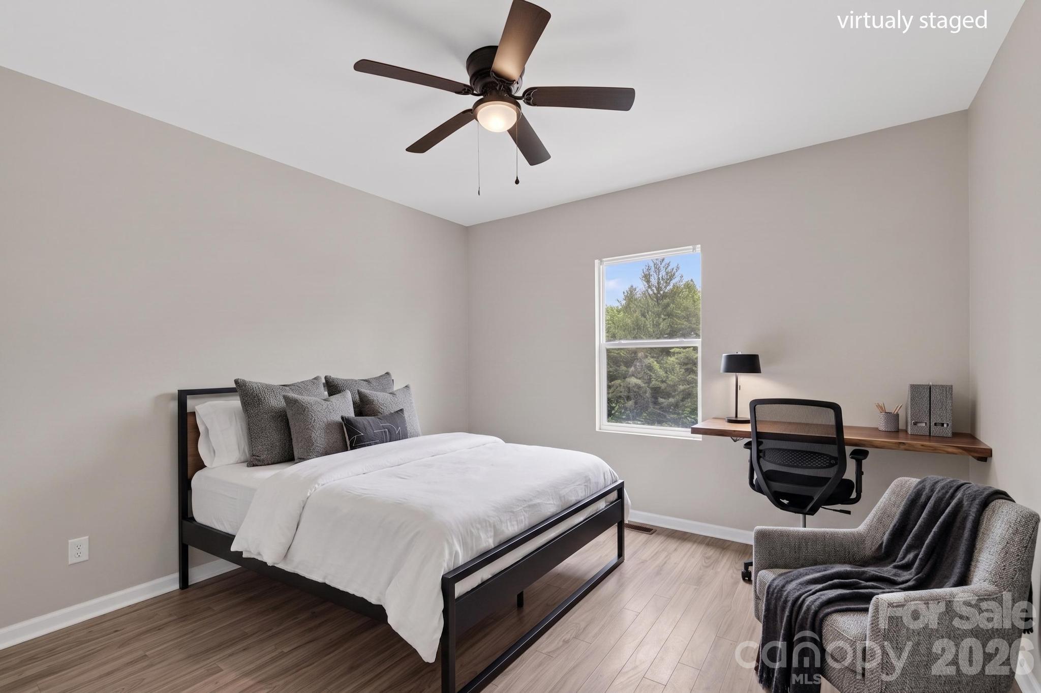 2119 South Road Morganton, NC 28655 - Photo 37 of 47 a bedroom with a bed and a couch