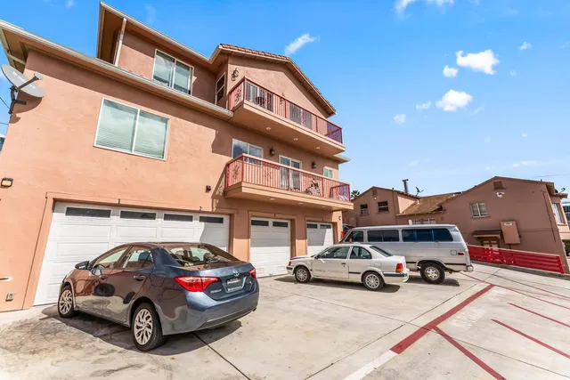 a car parked in front of a house