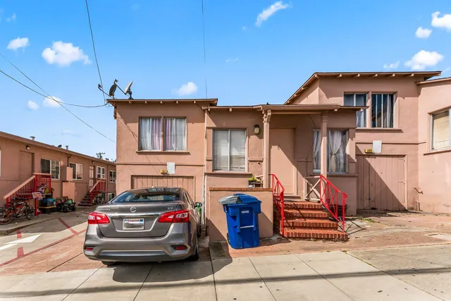 a car parked in front of a house