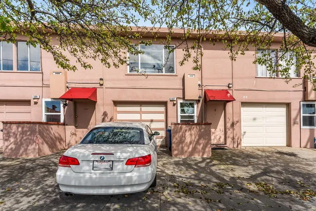 a backyard of a house with seating space