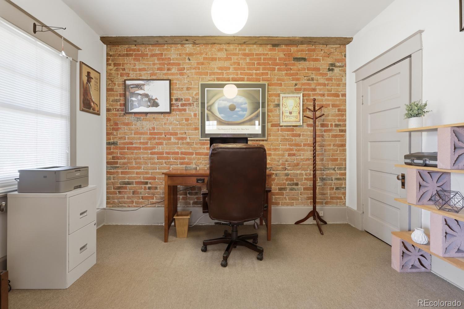 1630 Albion Street Denver, CO 80220 - Photo 11 of 28 a workspace with furniture