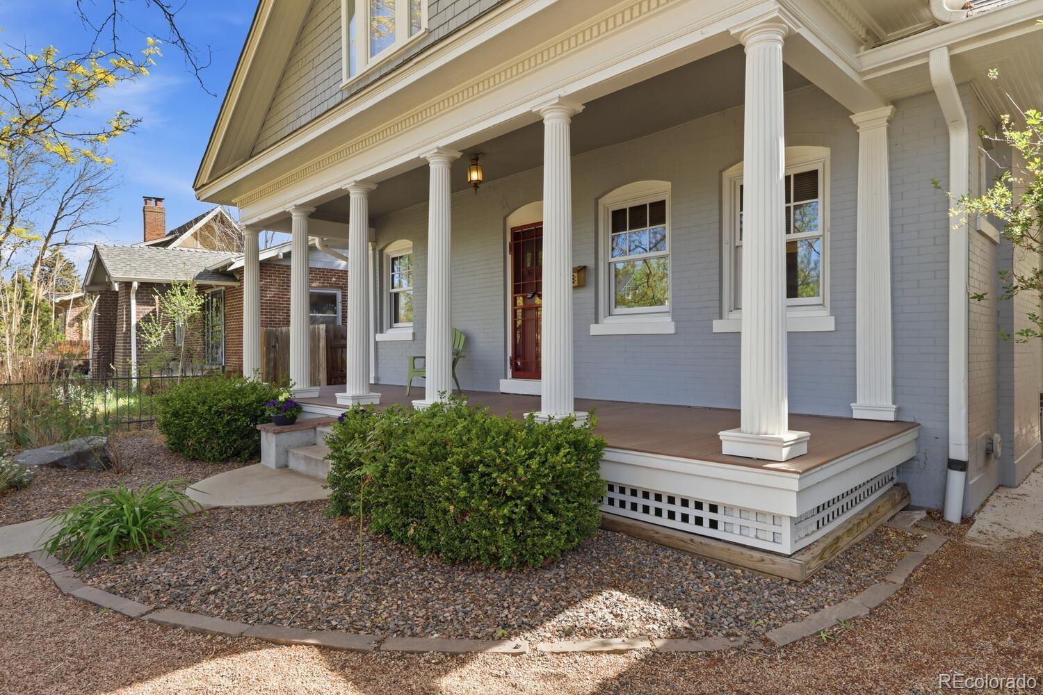 1630 Albion Street Denver, CO 80220 - Photo 2 of 28 a front view of a house with garden