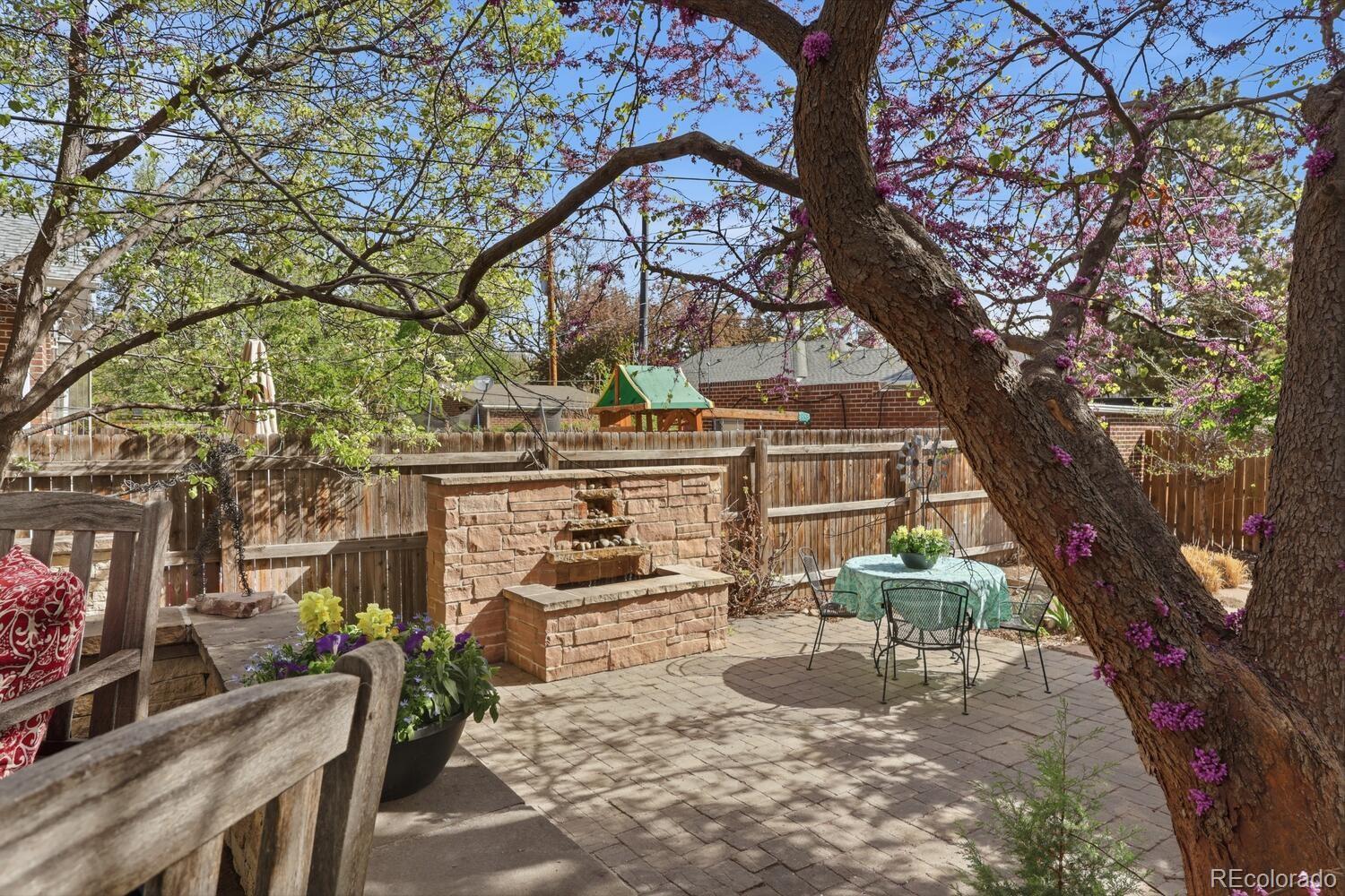 1630 Albion Street Denver, CO 80220 - Photo 25 of 28 a view of a chairs and table in the patio