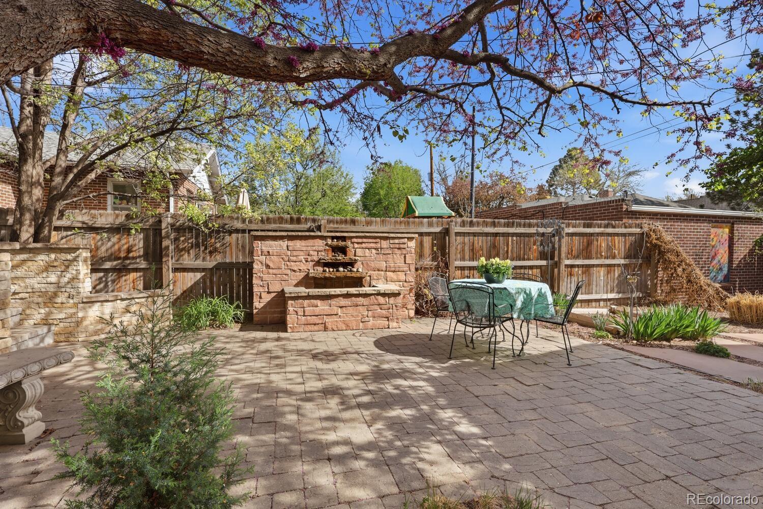 1630 Albion Street Denver, CO 80220 - Photo 26 of 28 a view of house with outdoor seating space