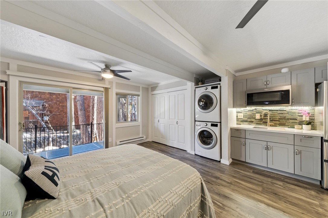 989 Tahoe Boulevard, Unit 91 Incline Village, NV 89451 - Photo 22 of 31 a bedroom with a bed and a large window