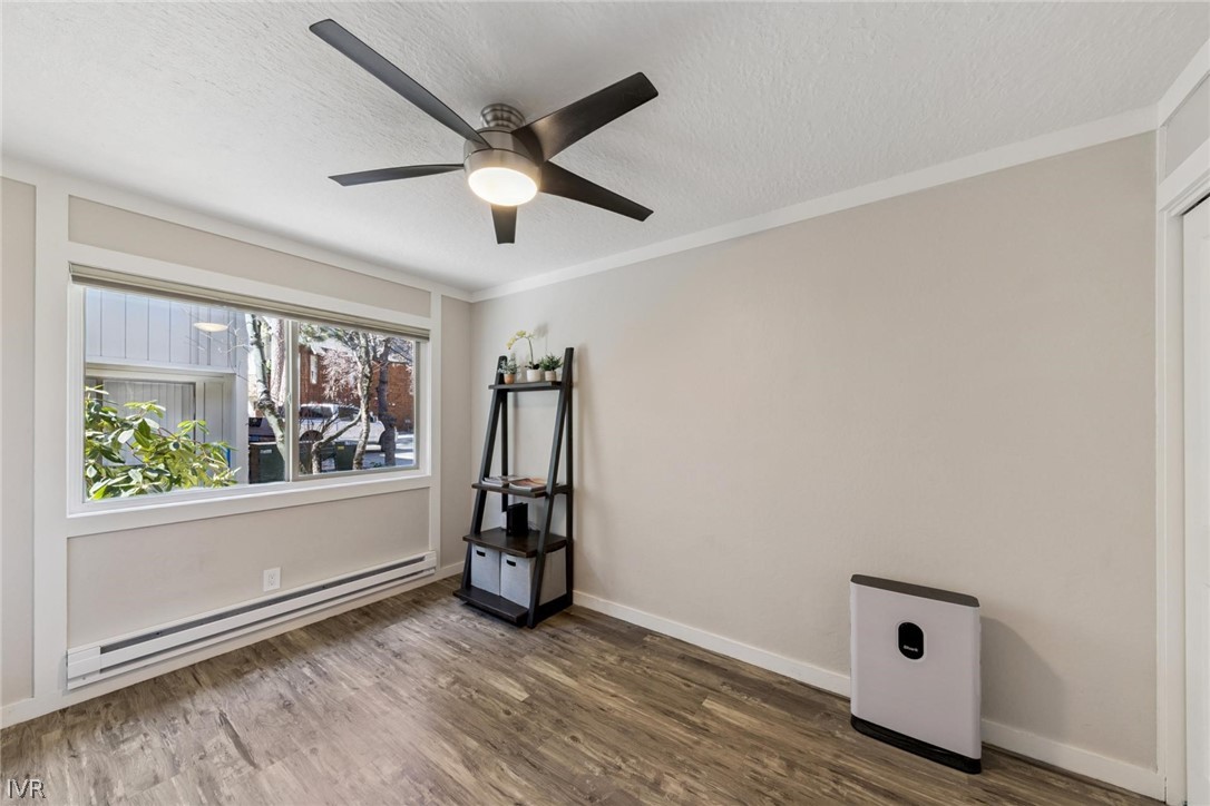 989 Tahoe Boulevard, Unit 91 Incline Village, NV 89451 - Photo 27 of 31 an empty room with windows and fan