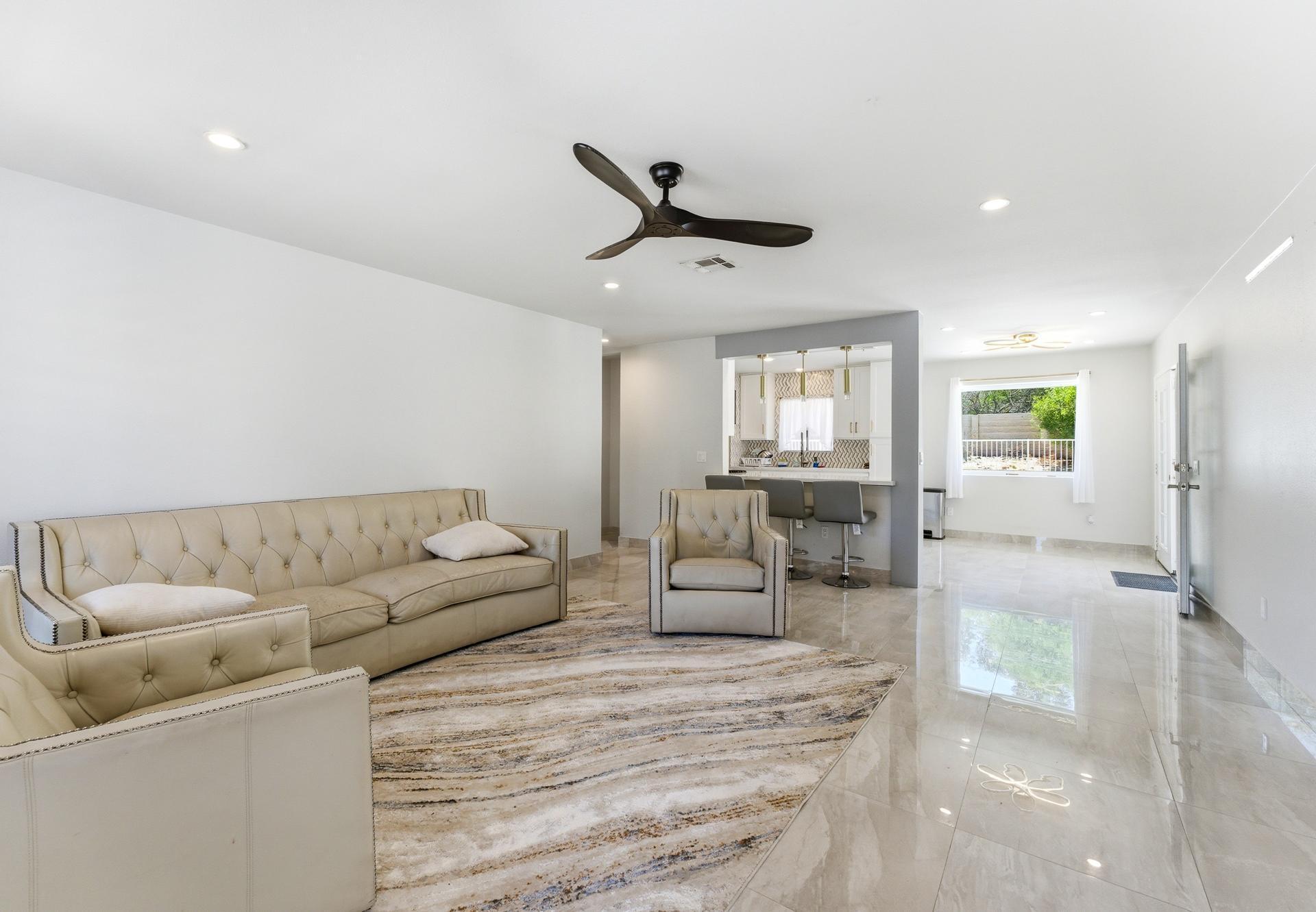 40961 Cecina Way Bermuda Dunes, CA 92203 - Photo 6 of 27 a living room with furniture and a wooden floor