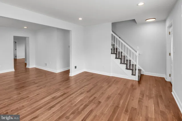 a view of entryway with wooden floor