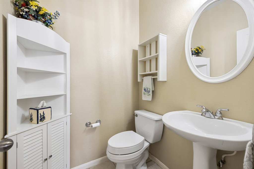207 Rosedale Boulevard Georgetown, TX 78628 - Photo 25 of 30 Half bath located downstairs by the living room.