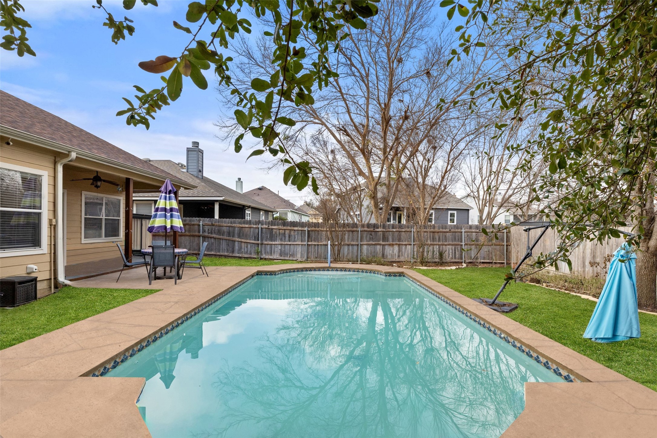 207 Rosedale Boulevard Georgetown, TX 78628 - Photo 27 of 31 a view of swimming pool with lounge chair and dinning table