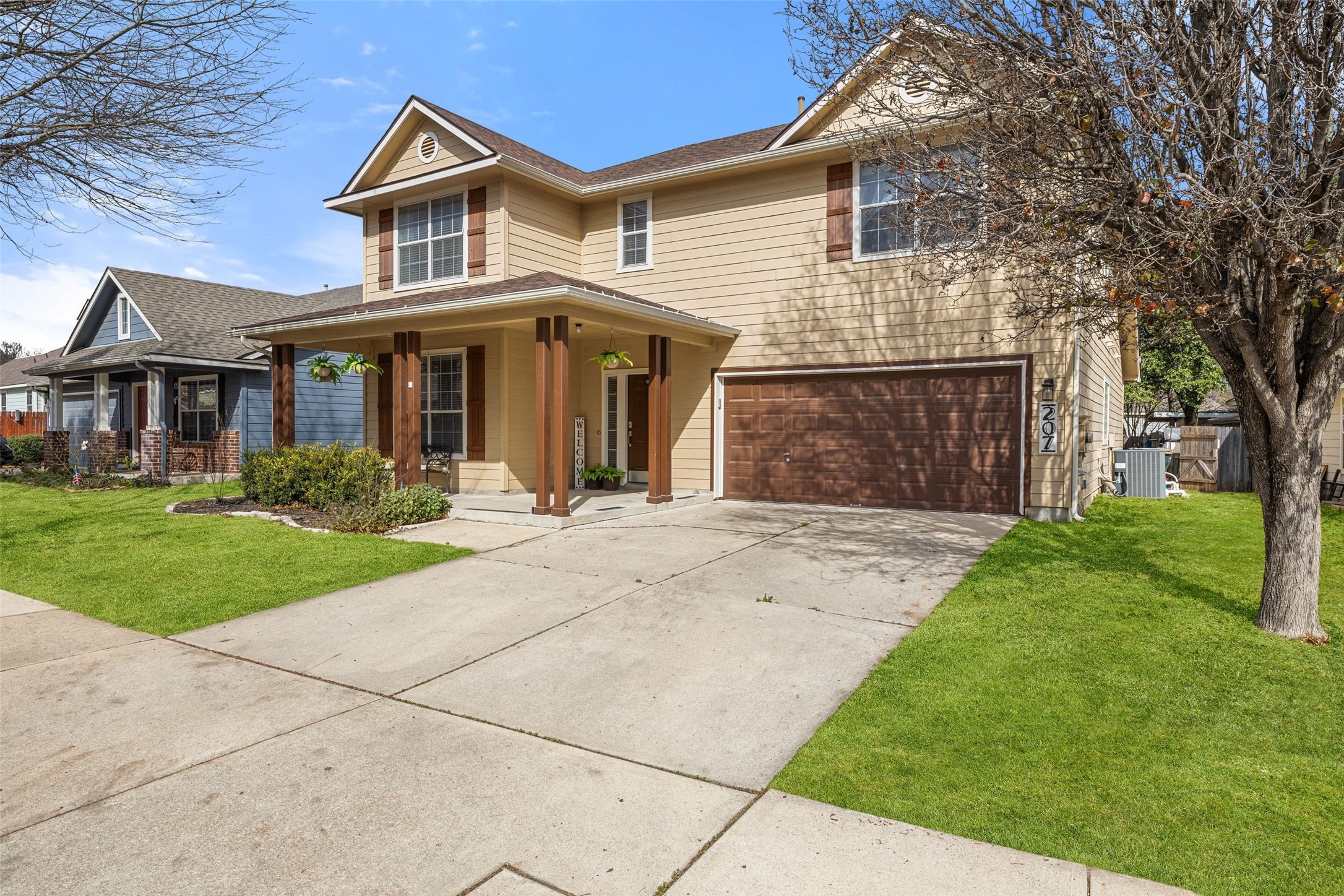 207 Rosedale Boulevard Georgetown, TX 78628 - Photo 30 of 31 a front view of a house with a garden and yard