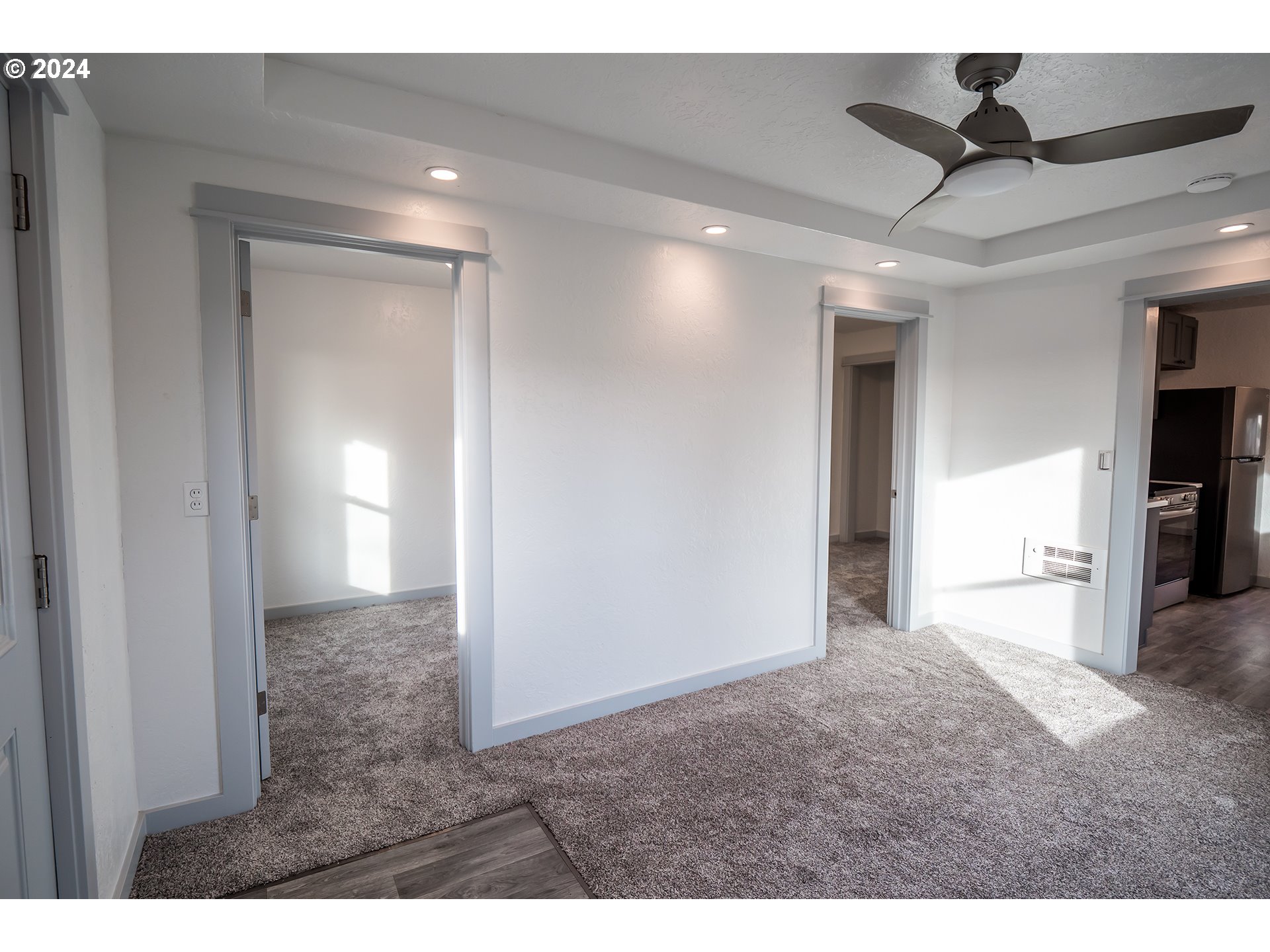 930 Elm Street Junction City, OR 97448 - Photo 11 of 33 a view of empty room with kitchen