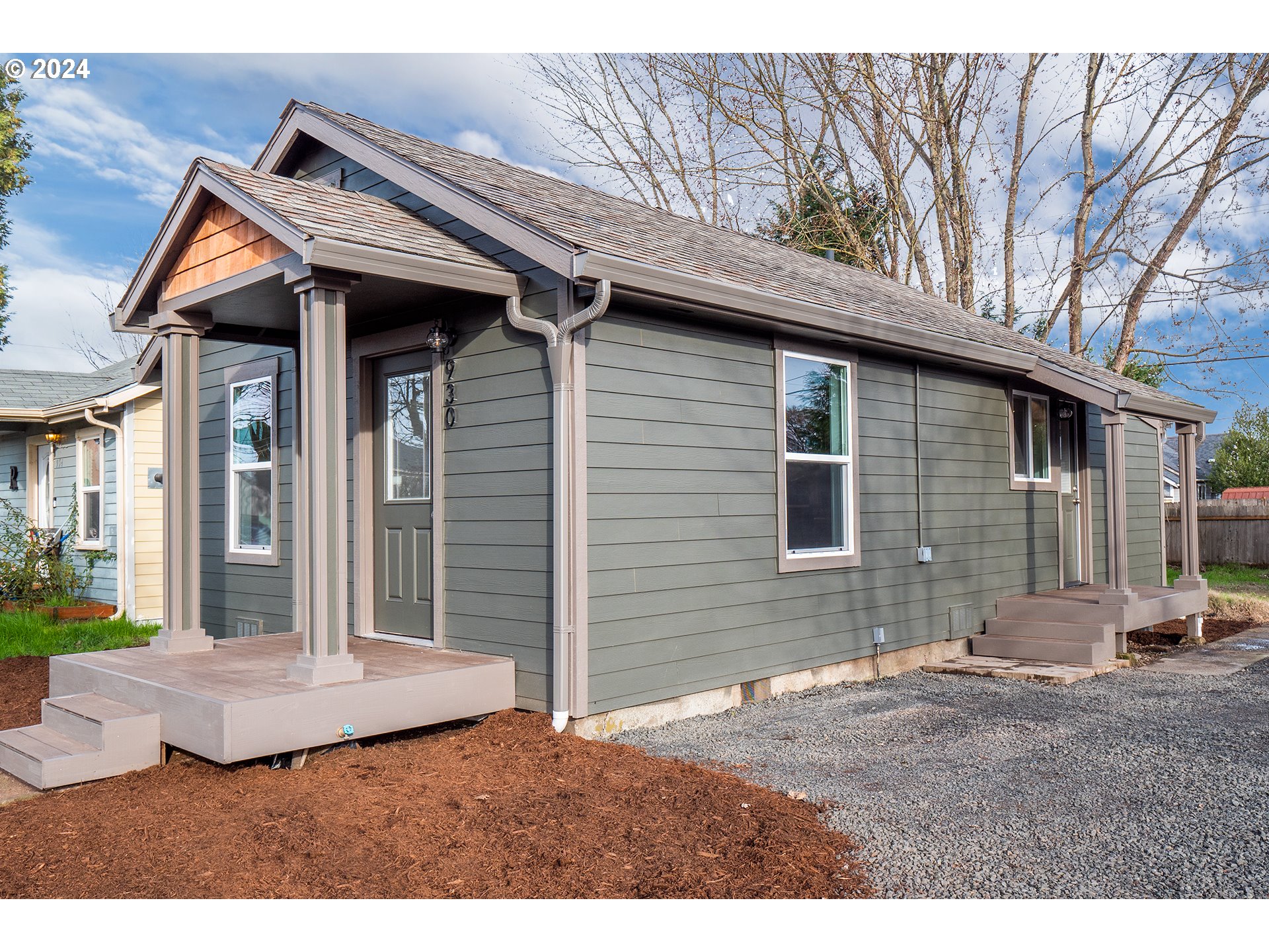 930 Elm Street Junction City, OR 97448 - Photo 21 of 33 a front view of a house with garden