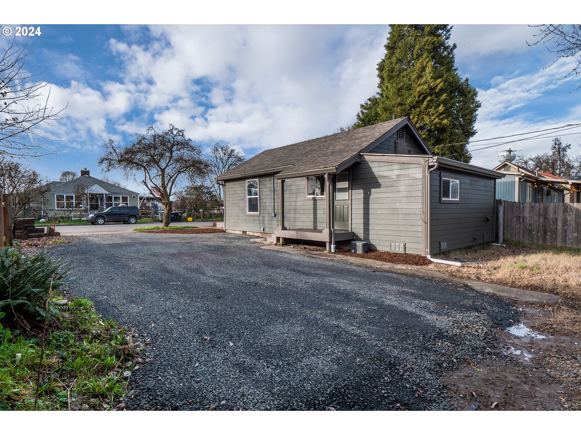 930 Elm Street Junction City, OR 97448 - Photo 23 of 33 a view of a house with a yard and pathway