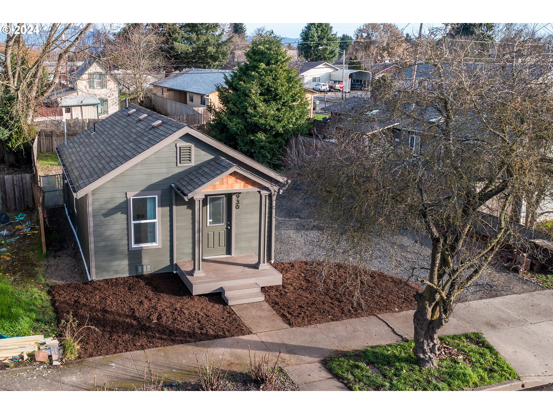 930 Elm Street Junction City, OR 97448 - Photo 29 of 33 a front view of a house with a yard and mountain view