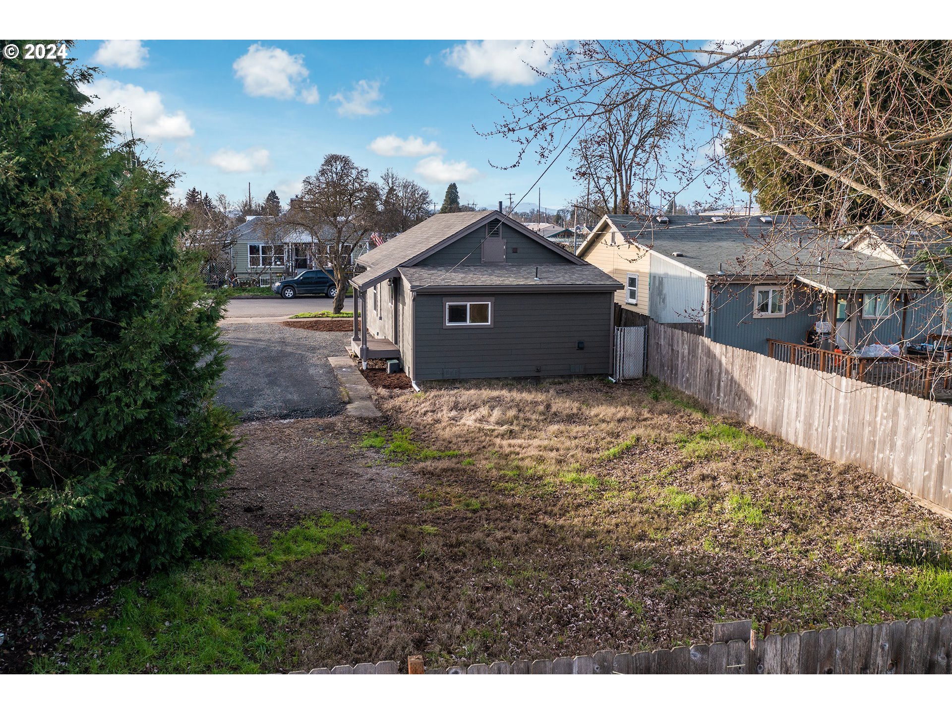 930 Elm Street Junction City, OR 97448 - Photo 31 of 33 a view of a large house with a yard