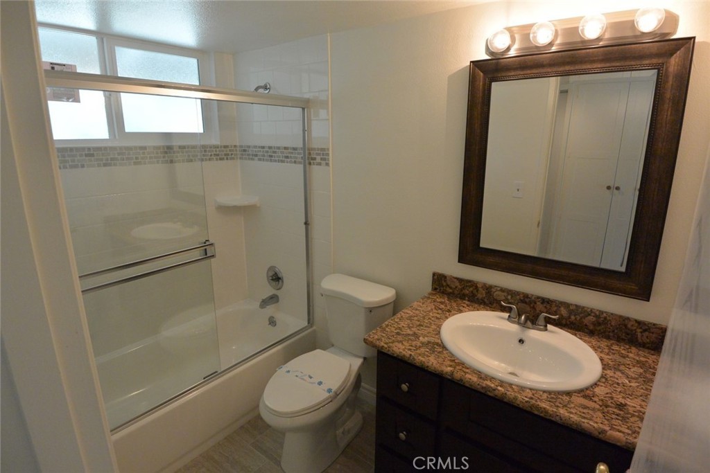 11392 Wallingsford Road Los Alamitos, CA 90720 - Photo 8 of 17 a bathroom with a sink toilet and shower