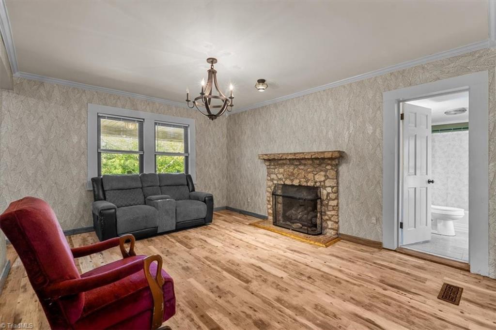 907 Irvin Farm Road Reidsville, NC 27320 - Photo 12 of 48 Living room with gas log fireplace