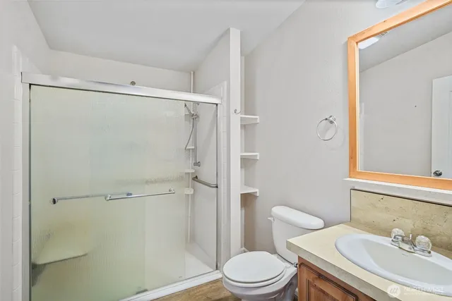 a garage room with furniture and gym equipment