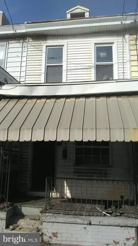 a front view of a house with windows