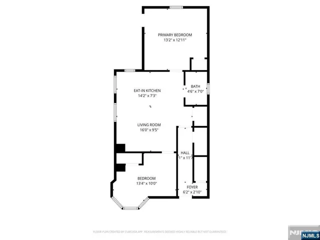 a living room with furniture and a dining table with wooden floor