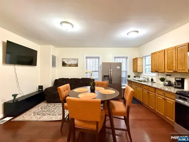 a view of a dining room with furniture