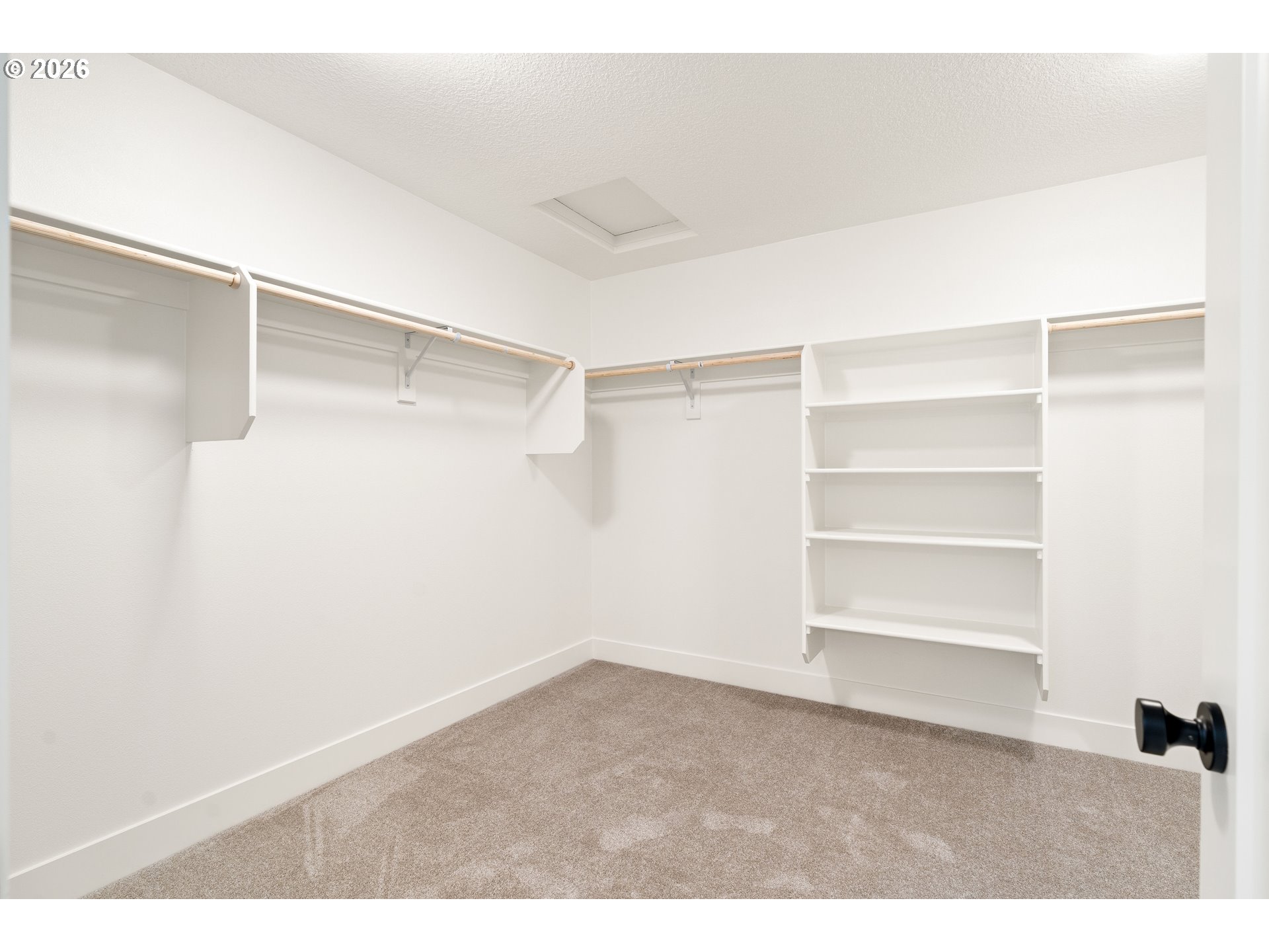 2803 Northwest 114th Terrace Portland, OR 97229 - Photo 18 of 22 a view of an empty walk in closet